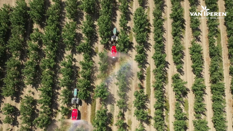 Aerial view of tractor applying Van Iperen's fertilizers on an apple orchard - Van Iperen International